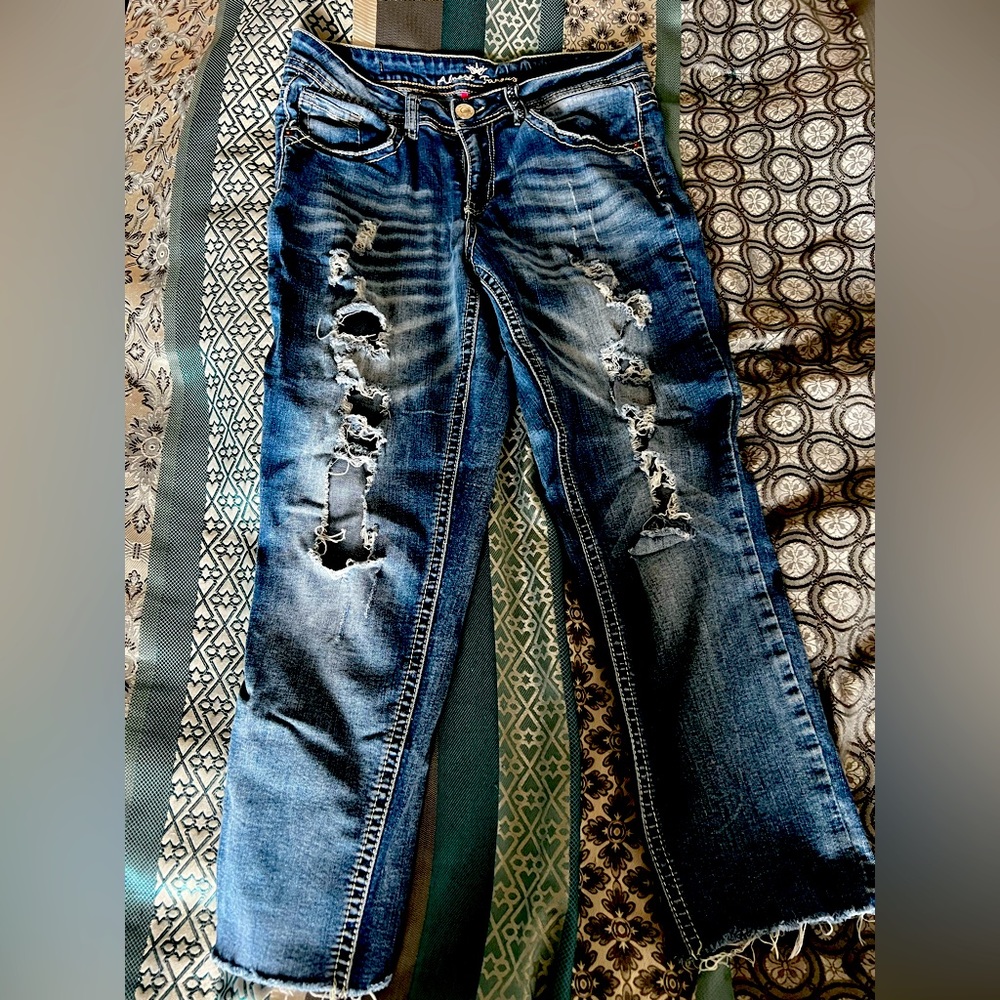 Ripped mid rise denim jeans